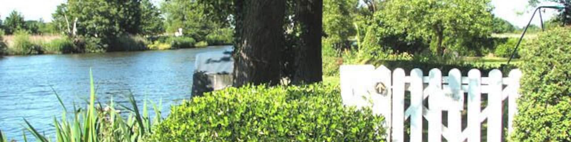 Public footpath traversing private properties. This section of the path skirts the riverside gardens of adjoining properties. The walk > https://www.geograph.org.uk/photo/1358319 starts by St Mary's church > https://www.geograph.org.uk/photo/1280845 leading in westerly direction. It winds its way downwards > 1358328 to the River Yare, following a woodland edge before it reaches the bottom of the valley and the reed beds growing beside the river > 1358349. A footbridge > 1358351 leads over a drainage ditch and a short walk > 1358355 leads to the river bank > 1358357. A narrow path flanked by dense vegetation follows the river from here onwards until it emerges by the car park on Bramerton Common. The Wherryman's Way > https://www.geograph.org.uk/photo/1340030 is a 35-mile long distance footpath following the route of the Broads trading wherries between Norwich and Great Yarmouth. The route takes its name from the wherry - a large cargo-carrying barge whose black sails used to be a common sight on these waters. Ten circular village walks branch off this path along the way.