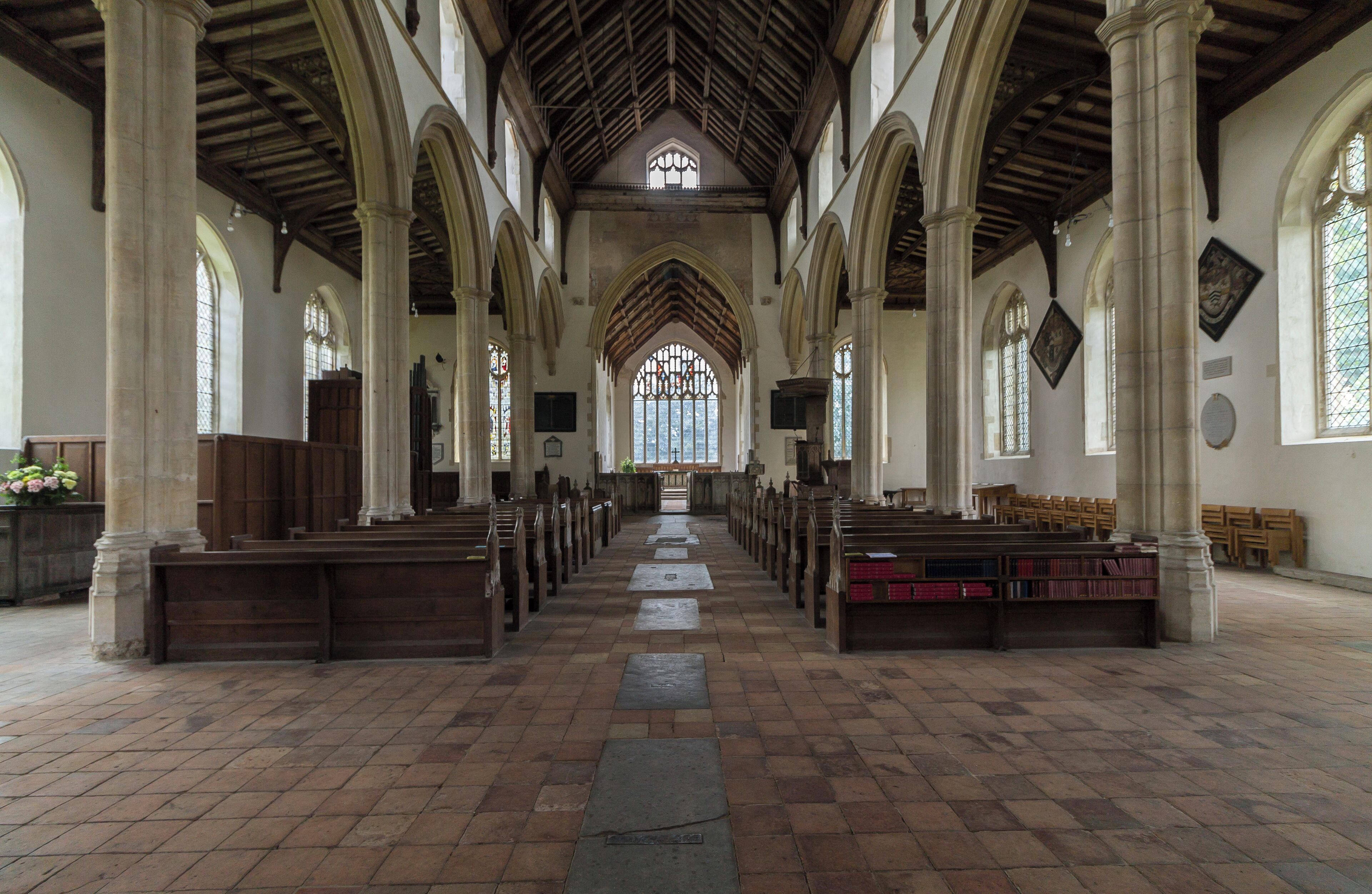 Grade I listed This large perpendicular church in a relatively remote location was built between around 1405 and 1420. It was financed by at least four Lords of Manors and other men with wealth acquired from wool. There were at least six Guilds Chapels, and a chaplain and clerks in each Chapel prayed daily for donors' souls. There is a west tower, north and south porch with parvises, nave with clerestory, north and south aisles, north and south transepts and chancel. The west tower is of four stages, the last stage was built around 1511. There is a west door with censing Angels and Shields over it. The centre of the tower has a "sound hole" with delicate tracery. The top has richly decorated battlements. There are eight bells. The north and south porches are of two storeys, with stair turret access. The north porch parvise has a vaulted ceiling with carved bosses. There is the remains of a piscina, and this was probably a Lady Chapel. The south porch has a standard beamed roof, and the parvise was probably a Treasury, as the timbers of the roof have iron bands for protection. The nave has six-bay arcades, the piers having four shafts. There is a tall clerestory, and a window over the chancel arch. The chancel has a seven light east window of plain glass with some mediaeval glass in the tracery depicting the nine orders of Angels. The south transept has a four light south window and a three light east window. There is some mediaeval glass in the traceries. The north transept, originally a Chapel of Thomas Rose, d. 1441, was restored in 1910 by Sir Alfred Jodrell. He donated three stained-glass windows, some of which have original glass in the tracery. The western window represents the history of the church. The top four lights of the west window contain a message "Hear this ye old men and give ear all ye inhabitants of the land, hath this been in your days or even in the days of your fathers?". The north window has been blocked. The roof, like many other East Anglian churches, has carved Angels, most of which retain the original painting. There are also carved roof bosses in the chancel with various scenes, e.g. Nativity, Last Supper etc. There is a tall tower arch with a ringing gallery at the base of the tower. This also houses a balustrade and crane supporting the font canopy, all done in carved wood with original colours. The octagonal font from circa 1437 depicts the Seven Sacraments and The Crucifixion. There is also an inscription recording the donors John and Agnes Luce. The figures at the base have been mutilated. The pulpit is originally from the 15th century and was converted into a triple-decker in 1611. The stalls have carvings on the armrests and misericords, and the benches have carved poppy heads. Little remains of the original screen, but the panels still retain original paint depicting the Doctors of the Church and The Apostles. There are several good brasses in the church, including a "shroud brass" to John Brigge, and one to Geoffrey Boleyn. At the end of the 19th century the church was in a poor state of repair. Sir Woolmer White and Sir Alfred Jodrell plus others funded repairs. The restoration was sympathetically done. There is a modest two manual organ which was presented by Sir Woolmer White in 1912. Pic by Jenny.