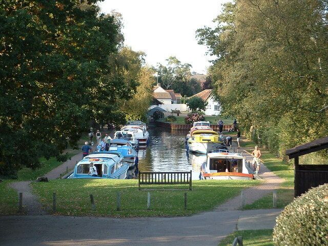 Neatishead Staithe Holiday cruisers in the evening sun.