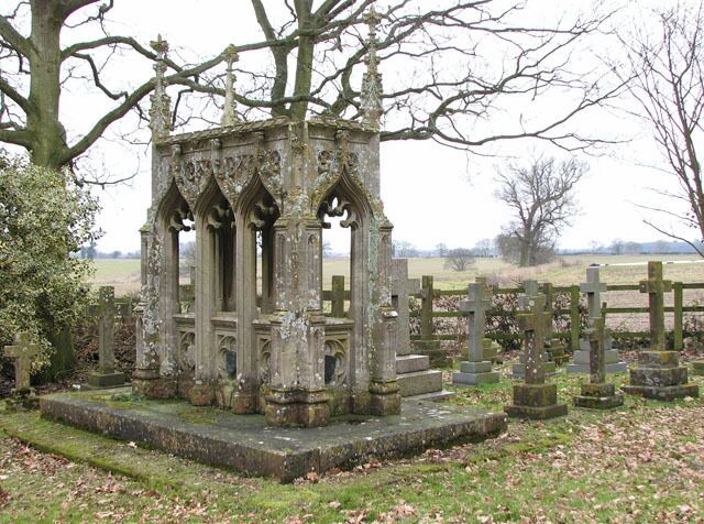 The church of St Remigius - view from the churchyard. Fields adjoining the churchyard of St Remigius > 1746839 in the north, as seen past an ornate tomb chest in the north-east corner.