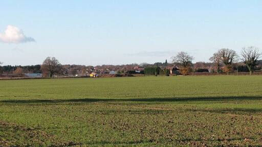 Field adjoining path. This view was taken from a public footpath which starts at Smee Lane > 919906 and leads to the A47, further to the south > 1068458 - 1068463. The field seen in the foreground, with a winter crop growing, adjoins the path in the west. Thorpe St Andrew can be seen in the distance (in adjacent grid square).