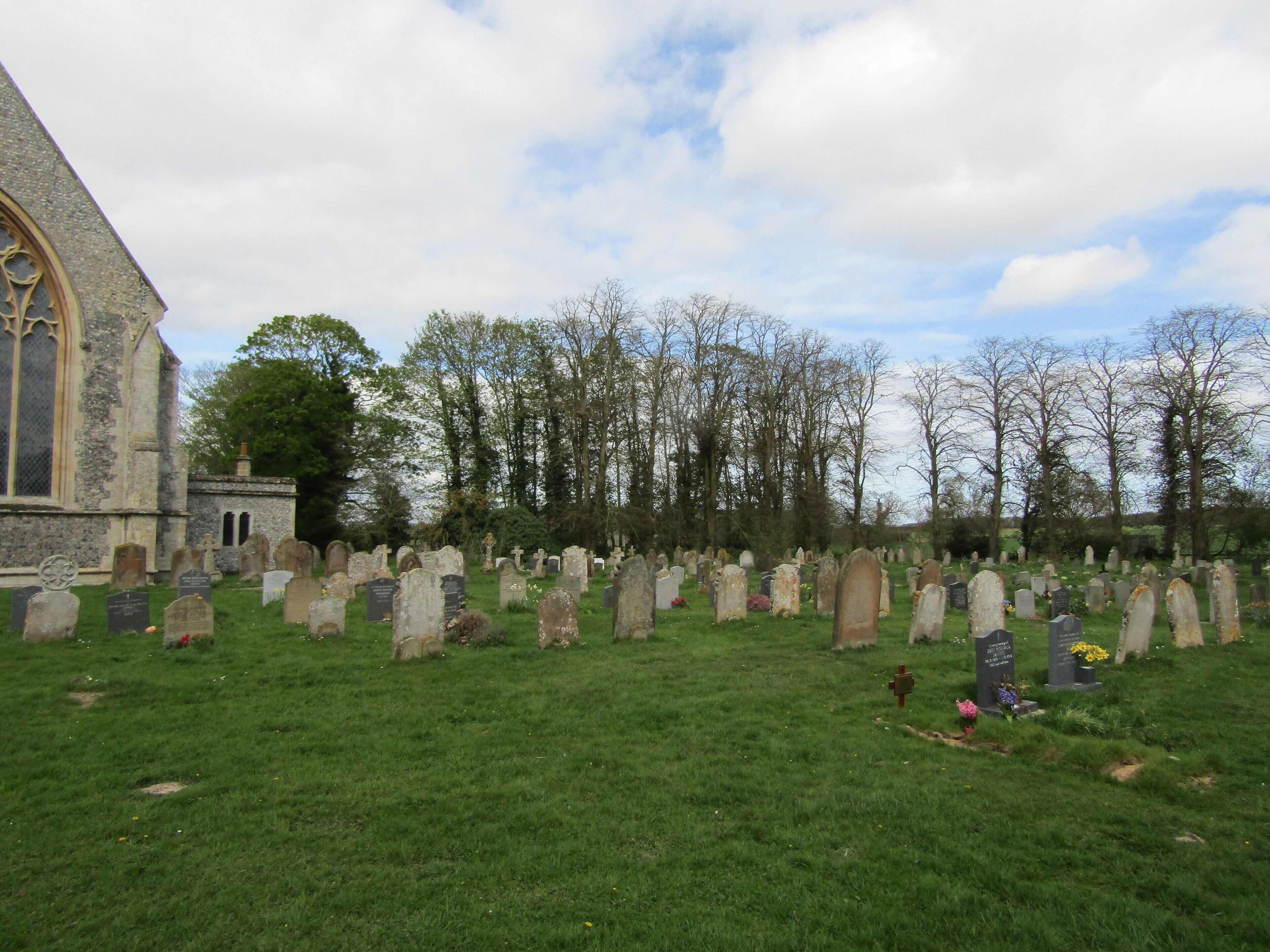A view of the churchyard of the parish church of Saint James which is located in the village of Southrepps, Norfolk, England.