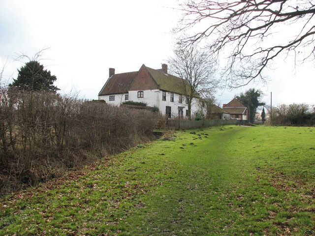 Mill Farm Mill Farmhouse and a converted barn at the end of Mill Lane - Mill Farmhouse is a mid-C18 building with two storeys in four bays, with a wing to the rear which dates from the late 17th century. This view was taken from the public footpath which starts here.