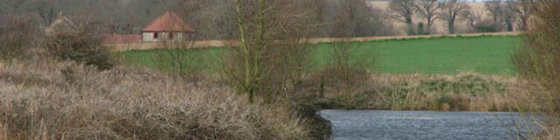 View across the reservoir This reservoir is fed by Mundesley Beck.