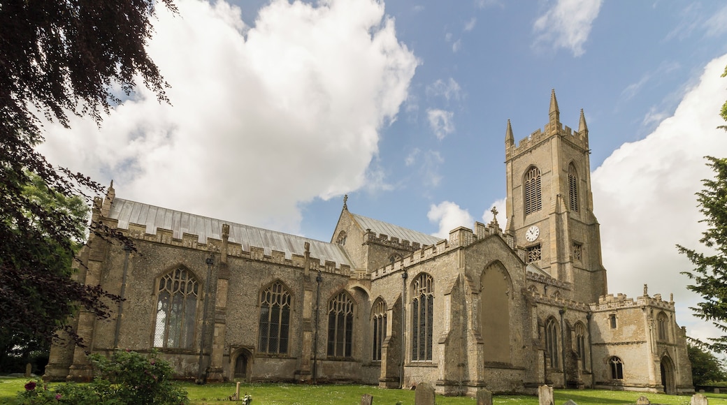 Grade I listed This large perpendicular church in a relatively remote location was built between around 1405 and 1420. It was financed by at least four Lords of Manors and other men with wealth acquired from wool. There were at least six Guilds Chapels, and a chaplain and clerks in each Chapel prayed daily for donors' souls. There is a west tower, north and south porch with parvises, nave with clerestory, north and south aisles, north and south transepts and chancel. The west tower is of four stages, the last stage was built around 1511. There is a west door with censing Angels and Shields over it. The centre of the tower has a "sound hole" with delicate tracery. The top has richly decorated battlements. There are eight bells. The north and south porches are of two storeys, with stair turret access. The north porch parvise has a vaulted ceiling with carved bosses. There is the remains of a piscina, and this was probably a Lady Chapel. The south porch has a standard beamed roof, and the parvise was probably a Treasury, as the timbers of the roof have iron bands for protection. The nave has six-bay arcades, the piers having four shafts. There is a tall clerestory, and a window over the chancel arch. The chancel has a seven light east window of plain glass with some mediaeval glass in the tracery depicting the nine orders of Angels. The south transept has a four light south window and a three light east window. There is some mediaeval glass in the traceries. The north transept, originally a Chapel of Thomas Rose, d. 1441, was restored in 1910 by Sir Alfred Jodrell. He donated three stained-glass windows, some of which have original glass in the tracery. The western window represents the history of the church. The top four lights of the west window contain a message "Hear this ye old men and give ear all ye inhabitants of the land, hath this been in your days or even in the days of your fathers?". The north window has been blocked. The roof, like many other East Anglian churches, has carved Angels, most of which retain the original painting. There are also carved roof bosses in the chancel with various scenes, e.g. Nativity, Last Supper etc. There is a tall tower arch with a ringing gallery at the base of the tower. This also houses a balustrade and crane supporting the font canopy, all done in carved wood with original colours. The octagonal font from circa 1437 depicts the Seven Sacraments and The Crucifixion. There is also an inscription recording the donors John and Agnes Luce. The figures at the base have been mutilated. The pulpit is originally from the 15th century and was converted into a triple-decker in 1611. The stalls have carvings on the armrests and misericords, and the benches have carved poppy heads. Little remains of the original screen, but the panels still retain original paint depicting the Doctors of the Church and The Apostles. There are several good brasses in the church, including a "shroud brass" to John Brigge, and one to Geoffrey Boleyn. At the end of the 19th century the church was in a poor state of repair. Sir Woolmer White and Sir Alfred Jodrell plus others funded repairs. The restoration was sympathetically done. There is a modest two manual organ which was presented by Sir Woolmer White in 1912. Pic by Jenny.