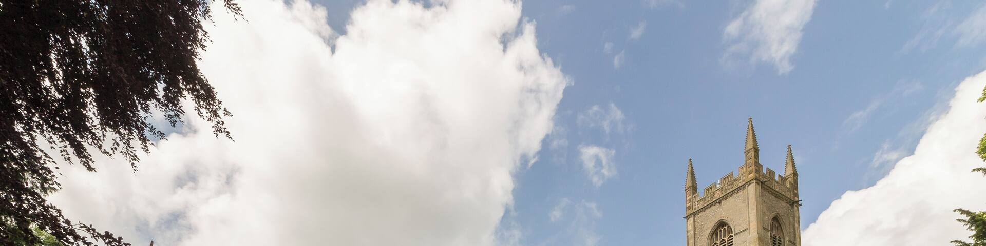 Grade I listed This large perpendicular church in a relatively remote location was built between around 1405 and 1420. It was financed by at least four Lords of Manors and other men with wealth acquired from wool. There were at least six Guilds Chapels, and a chaplain and clerks in each Chapel prayed daily for donors' souls. There is a west tower, north and south porch with parvises, nave with clerestory, north and south aisles, north and south transepts and chancel. The west tower is of four stages, the last stage was built around 1511. There is a west door with censing Angels and Shields over it. The centre of the tower has a "sound hole" with delicate tracery. The top has richly decorated battlements. There are eight bells. The north and south porches are of two storeys, with stair turret access. The north porch parvise has a vaulted ceiling with carved bosses. There is the remains of a piscina, and this was probably a Lady Chapel. The south porch has a standard beamed roof, and the parvise was probably a Treasury, as the timbers of the roof have iron bands for protection. The nave has six-bay arcades, the piers having four shafts. There is a tall clerestory, and a window over the chancel arch. The chancel has a seven light east window of plain glass with some mediaeval glass in the tracery depicting the nine orders of Angels. The south transept has a four light south window and a three light east window. There is some mediaeval glass in the traceries. The north transept, originally a Chapel of Thomas Rose, d. 1441, was restored in 1910 by Sir Alfred Jodrell. He donated three stained-glass windows, some of which have original glass in the tracery. The western window represents the history of the church. The top four lights of the west window contain a message "Hear this ye old men and give ear all ye inhabitants of the land, hath this been in your days or even in the days of your fathers?". The north window has been blocked. The roof, like many other East Anglian churches, has carved Angels, most of which retain the original painting. There are also carved roof bosses in the chancel with various scenes, e.g. Nativity, Last Supper etc. There is a tall tower arch with a ringing gallery at the base of the tower. This also houses a balustrade and crane supporting the font canopy, all done in carved wood with original colours. The octagonal font from circa 1437 depicts the Seven Sacraments and The Crucifixion. There is also an inscription recording the donors John and Agnes Luce. The figures at the base have been mutilated. The pulpit is originally from the 15th century and was converted into a triple-decker in 1611. The stalls have carvings on the armrests and misericords, and the benches have carved poppy heads. Little remains of the original screen, but the panels still retain original paint depicting the Doctors of the Church and The Apostles. There are several good brasses in the church, including a "shroud brass" to John Brigge, and one to Geoffrey Boleyn. At the end of the 19th century the church was in a poor state of repair. Sir Woolmer White and Sir Alfred Jodrell plus others funded repairs. The restoration was sympathetically done. There is a modest two manual organ which was presented by Sir Woolmer White in 1912. Pic by Jenny.