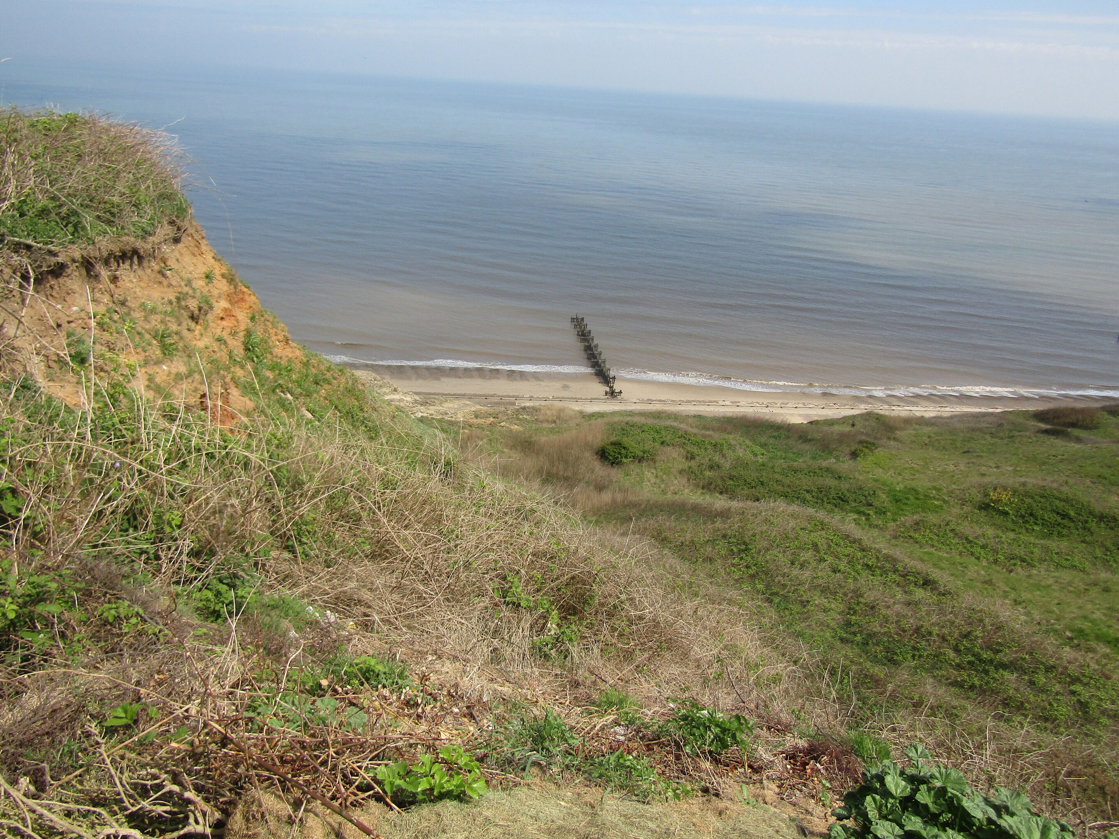 Looking westwards along Trimingham beach from the end of Loop road in the village of Trimingham, Norfolk, England.