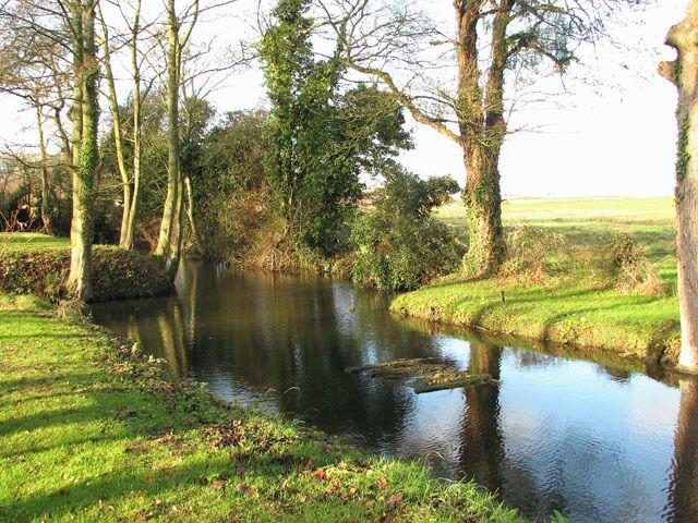 The green north of All Saints Church. For a view of the church see > 1614081.