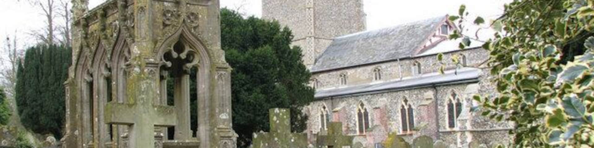 The church of St Remigius in Hethersett. There are only five churches in England which are dedicated to St Remigius. The church of St Remigius in Hethersett > 1746839 as we see it today dates primarily from the 14th century. The chancel had been in ruins since the Reformation and was rebuilt in 1898 with the nave roof partially reconstructed at the same time, which gives the structure a somewhat unusual profile. The interior was extensively restored in Victorian times and the arcades decorated with scripture and floral motifs > 1746881 but the 14th century font > 1746938 has survived. The church windows > 1746916 - 1746925 - 1746928 contain a fine collection of 19th and early 20th century stained glass.