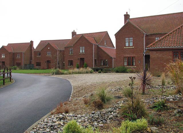 New houses Set back from Aylsham Road.