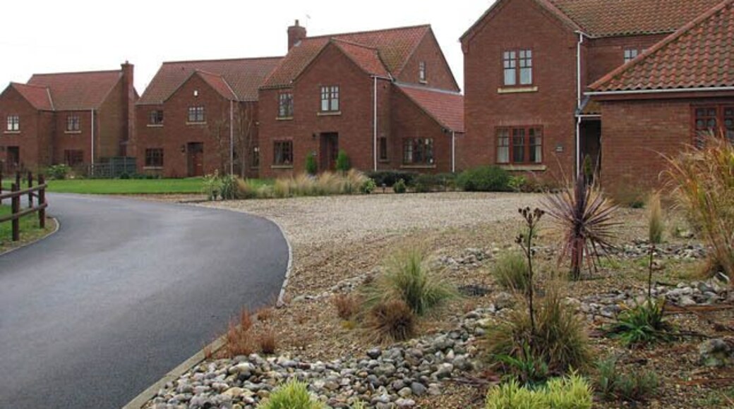 New houses Set back from Aylsham Road.