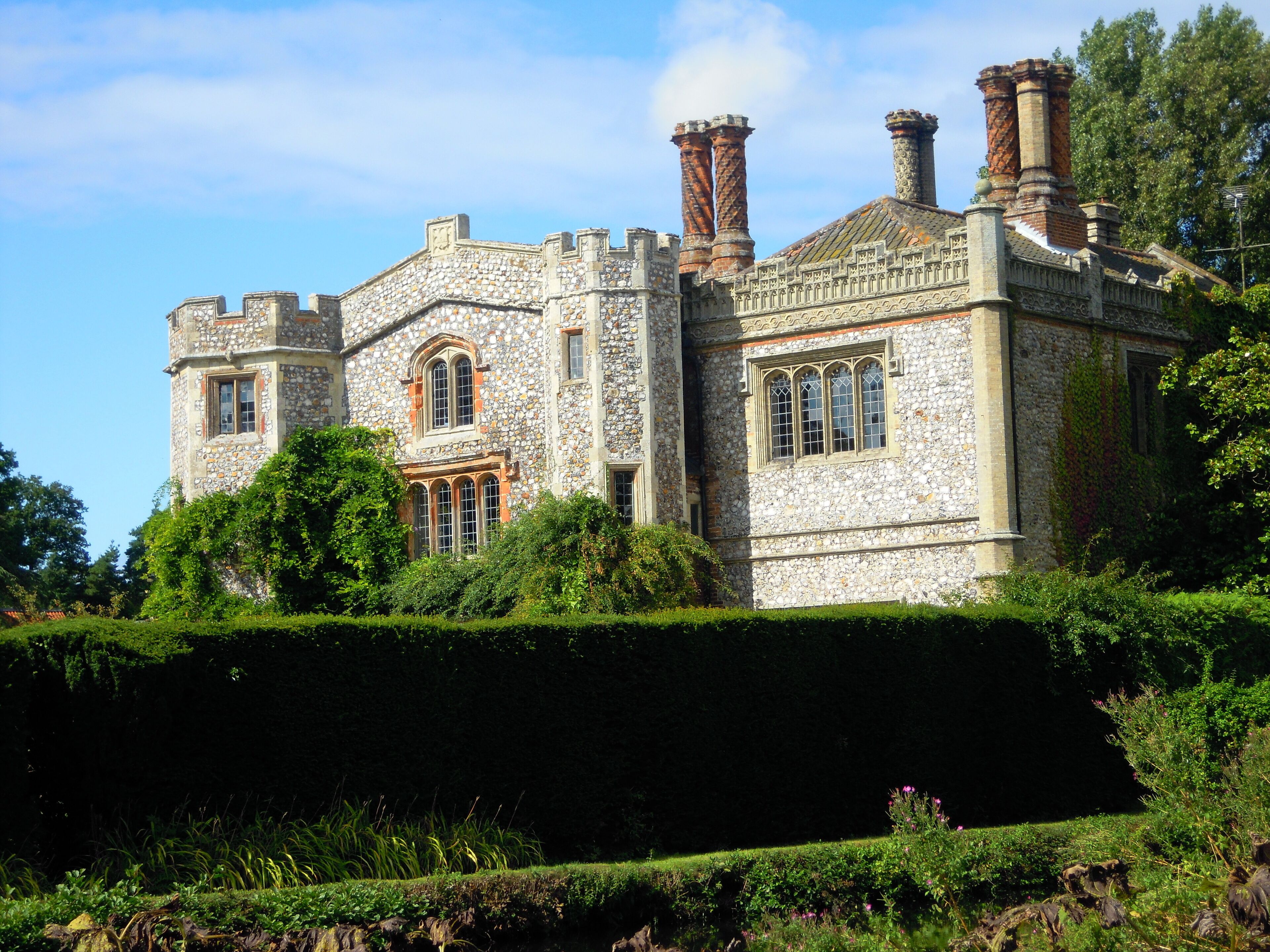 The south façade of Mannington Hall viewed from the south east, Norfolk, United Kingdom