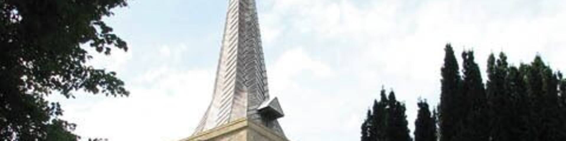 St Mary's church - tower and porch. St Mary's church > 1408886 - 1408907 as we see it today was mainly built during the 14th century. It is a large church with a square tower that is topped by a lead-covered spire. St Mary's was extensively restored by the then Rector, the Revd J.G. Fardell, in the late 19th century and the furnishings and stained glass windows as well as the ornate font cover date from this time. The nave roof > 1408947 has massive barn-like timbers, tie-beams and kingposts which all appear to be original as is the C14 octagonal font > 1408954. Another survival is the so-called Bardolph Effigy > 1408950 - a knight in armour who rests in a recess built into the north nave wall. Unusually, the statue is of carved oak, painted black presumably in the 19th century in order to resemble stone. According to tradition it depicts Sir Hugh Bardolph who was Lord of Greys Manor in the 12th century. The east window contains glass made by J.R. Clayton in 1857 > 1408914 while he was working with Powell & Sons of London. The north aisle east window > 1408916 is by the same stained glass artist and was made to designs by Henry Holiday. The glass on the south wall > 1408935 believed to be the rarest of the church, is thought to date from the 16th century, a time from which very little remains. 17th century Flemish glass > 1408932 can be found in one of the nave north windows and one of the north chancel windows were made by the well-known London glass maker C.E. Kempe > 1408930.