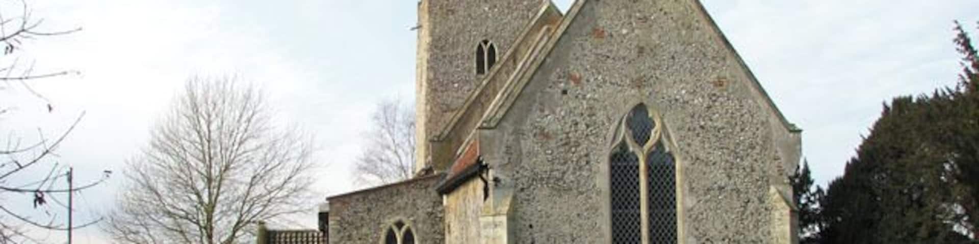 All Saints church. All Saints church > 1692081 - 1692114 dates from the 14th century and is a Grade II listed building. Its south porch is a later addition dating from the 15th or early 16th century, and an extension built onto the north wall and providing modern facilities was completed in 2009. The church houses a number of medieval survivals, amongst them several wall paintings - one depicting St Christopher, another the Annunciation > 1692151. A very rare depiction of a group of women surrounded by three devils, dominated by Titivallus - the Demon of Gossip - is painted on the north nave wall, clearly meant as a warning against gossiping. The rood screen > 1692117 is late C15. The octagonal font > 1692132 is of Purbeck marble and dates from Norman times, whereas the wooden painted cover was added in 1934.