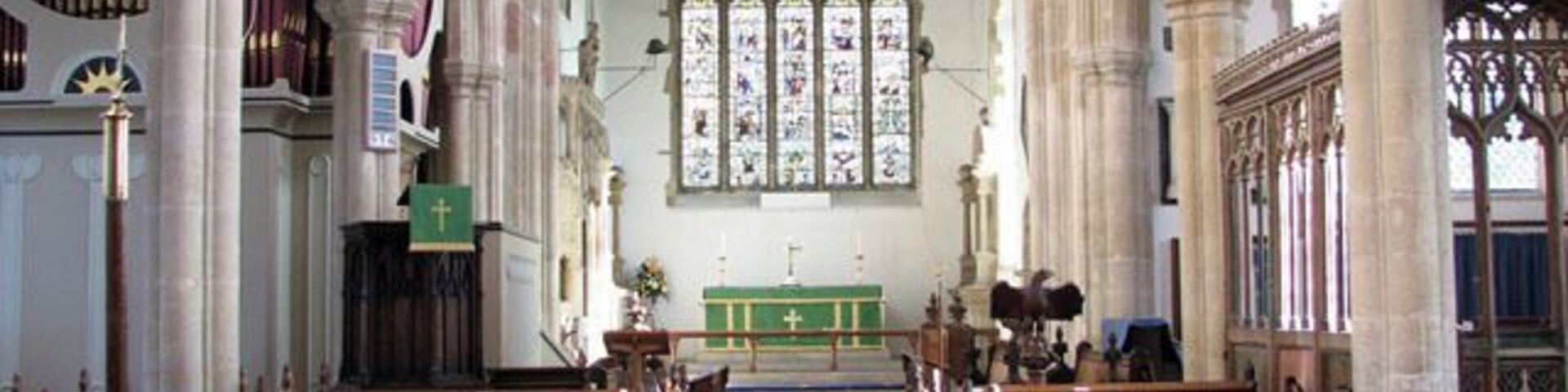 The church of SS Peter and Paul - view east. The church of SS Peter and Paul > 1702998 was built in the 15th century on the site of an older church. It has a magnificent hammerbeam roof which rises to a height of 45 feet above the floor. The building contains many other medieval survivals such as the panels of the chancel screen > 1703026 - an older screen surrounding the Lady Chapel with intricate carvings in its spandrels > 1703031 - choir stalls in the chancel > 1703049 - remains of a mural and the octagonal font > 1703053. There are also a number of interesting tombs. To members of the Lovell family on either side of the east window. To Anne, only child of Sir Robert Herling, on the north wall of the chancel > https://www.geograph.org.uk/photo/1703037. To Sir Robert Herling (d 1435) at the east end of the south aisle > https://www.geograph.org.uk/photo/1703041. To Sir Thomas Lovell and Dame Alice, his wife, with their crests (a bundle of peacock feathers and a Saracen's head) at their feet > https://www.geograph.org.uk/photo/1703043. The most noteworthy feature of the church, however, is the magnificent east window > https://www.geograph.org.uk/photo/1703014 which was donated to the church by Lady Anne Herling and her second husband, Sir Robert Wingfield, in around 1460. Removed for safety in Cromwell's time, the glass of this notable window was hidden in the attic of the since demolished East Harling Hall. When the manor was sold to Thomas Wright in 1736 he restored the glass to the church. It was removed once again during WWII and replaced and re-leaded in 1947.