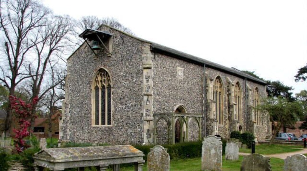 The former church of St Lawrence Perhaps the reason for there being two churches in close proximity to each other can be explained with the layout of paths and lanes, which may have made it convenient for worshippers of the two adjacent parishes to share a common churchyard. The former church of St Lawrence was gutted by fire in 1827 and after having been struck by lighning, its tower fell in 1971. The ruins have been restored and now serve as the parish hall. The ruined tower is surrounded by a sacristy garden planted with herbs. For more detailed information see http://www.norfolkchurches.co.uk/swalshamlawrence/swalshamstlawrence.htm