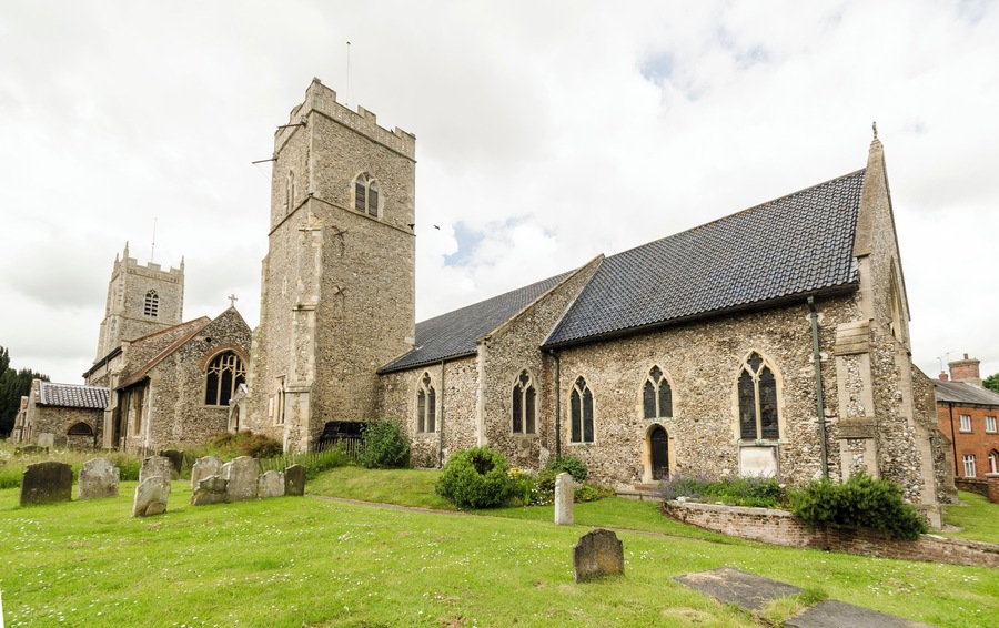 Reepham once had three churches almost touching each other, and two still stand. The main church is Saint Mary's, attached to this is St Michael's. The third church, All Saints' Hackford, was destroyed by fire in 1543 and the remnants mostly demolished in 1796. There is a small portion of the porch still extant opposite St Michael's tower. St Michael's church was the parish church of Whitwell until 1935 when the three parishes were amalgamated. It is now mainly used as a church hall. It has a tall west tower, nave, south porch and chancel which is linked to St Mary's church via a passageway. The tower is of two stages with battlements and pinnacles. Most of the church dates from the 14th and 15th century and has been recently converted into a church hall. At the east end there is a stained-glass window by Reginald Frampton. Saint Mary's church is a Grade I listed church dating from the 14th century, with a major restoration done in 1885. It is built of flint with a black pantile roof. There is a nave, north aisle, south porch, south tower (offset from the nave), south aisle and chancel. The clerestory was removed and the nave roof rebuilt circa 1790. The north arcade dates from the 14th century and has four bays with octagonal piers. The south arcade dates from the 13th century and also has four bays. The chancel was rebuilt during the Victorian restoration. On the north wall there is a monument probably to Roger de Kerdiston, died 1337. He lies on a bed of pebbles and there are eight weepers below. There is also a brass to Sir William de Kurdiston (d. 1391) and his wife Cecily. There is a Norman font of Purbeck marble from around 1200 at the west end of the church. Some of the bench ends have poppy heads with mediaeval animal carvings. There is a small organ and some stained glass windows. At the west end there is a linking passage to St Michael’s church.