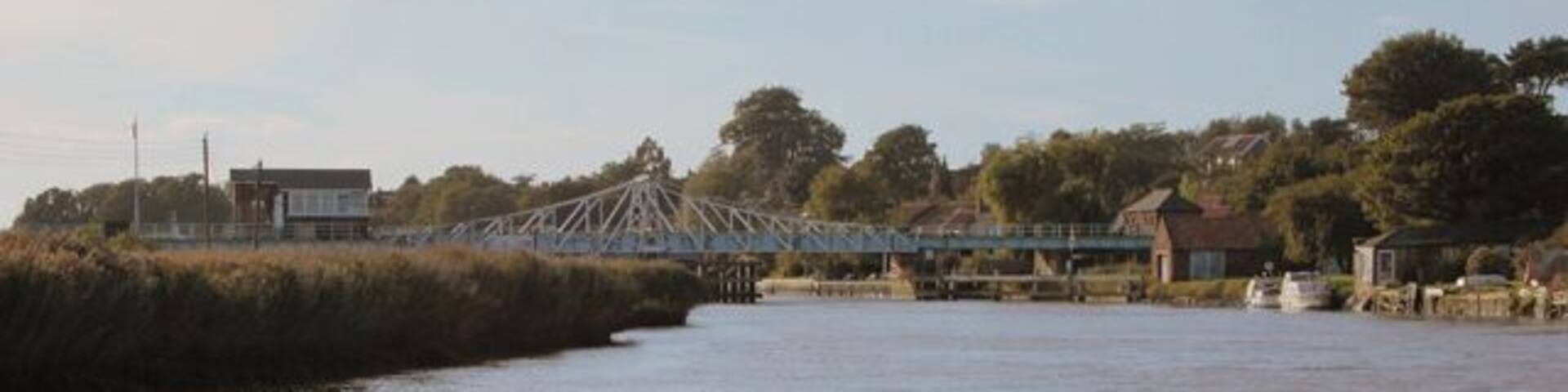 Reedham Swing Bridge - closed The swing bridge at Reedham as viewed from the River Yare, downstream of the bridge.