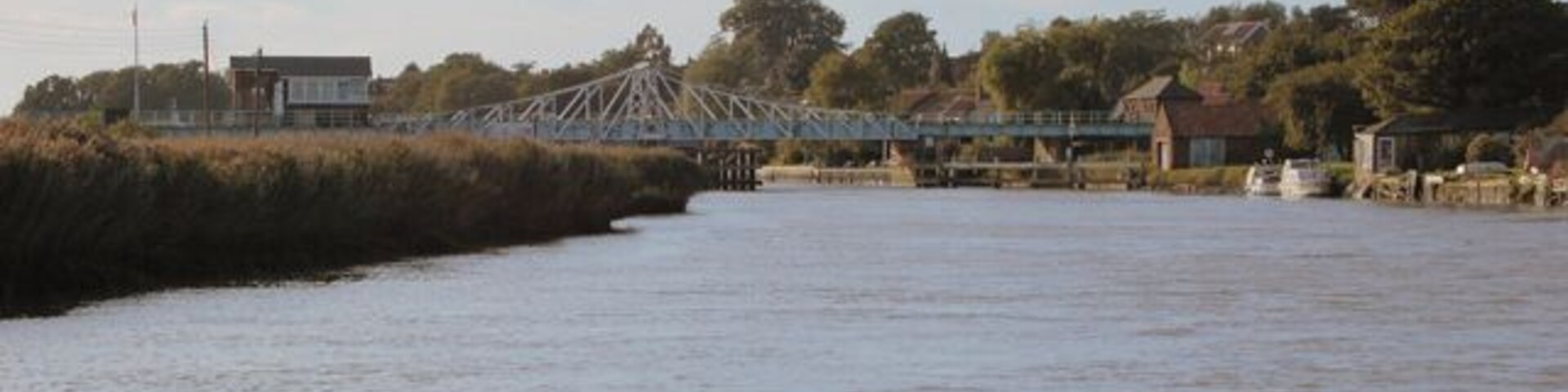 Reedham Swing Bridge - closed The swing bridge at Reedham as viewed from the River Yare, downstream of the bridge.