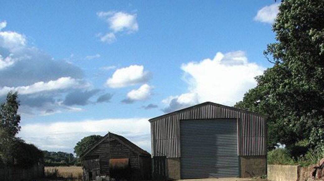 Old and new An old and a new shed standing side by side, by Smee Farm.