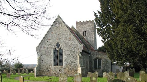 All Saints church. All Saints church > 1692081 - 1692114 dates from the 14th century and is a Grade II listed building. Its south porch is a later addition dating from the 15th or early 16th century, and an extension built onto the north wall and providing modern facilities was completed in 2009. The church houses a number of medieval survivals, amongst them several wall paintings - one depicting St Christopher, another the Annunciation > 1692151. A very rare depiction of a group of women surrounded by three devils, dominated by Titivallus - the Demon of Gossip - is painted on the north nave wall, clearly meant as a warning against gossiping. The rood screen > 1692117 is late C15. The octagonal font > 1692132 is of Purbeck marble and dates from Norman times, whereas the wooden painted cover was added in 1934.
