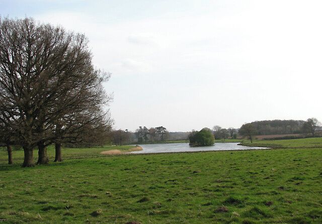 Wolterton Lake Viewed across cattle pasture. The waymarked public footpaths and permissive paths traversing Wolterton Park cover more than 20 miles; they lead around Wolterton and neighbouring Mannington, some connecting with the Weavers Way long distance footpath and the Holt circular walk. There also is an orienteering course and adventure playground.