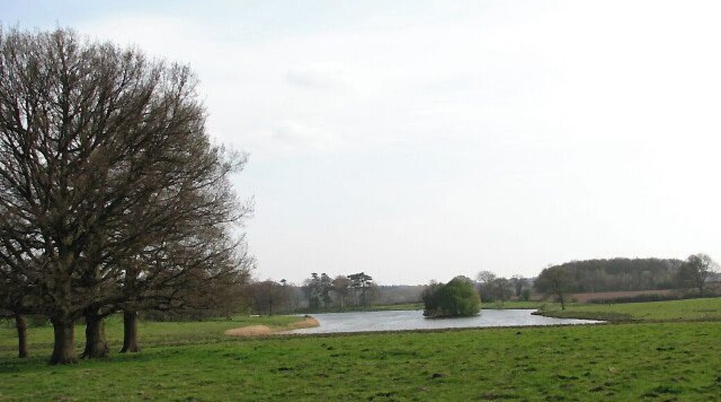 Wolterton Lake Viewed across cattle pasture. The waymarked public footpaths and permissive paths traversing Wolterton Park cover more than 20 miles; they lead around Wolterton and neighbouring Mannington, some connecting with the Weavers Way long distance footpath and the Holt circular walk. There also is an orienteering course and adventure playground.