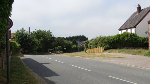 Looking westwards along Cromer Road in the village of Trimingham, Norfolk, United Kingdom.