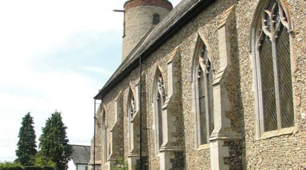 All Saints Church. All Saints church > 1355796 has a Saxon round tower which narrows towards the top and there is no separation between nave and chancel to be seen in the roofline. Sadly, this church is kept locked but on occasion of a display of wedding photographs in the church the door was open over a weekend, and it was possible to take photographs of the interior. All Saints church has timber-panelled roofs and modern furnishings > 1373948 - 1373986. A C14 rood screen > 1373954 has survived as has the piscina and triple sedilia > 1373962 dating from the same time, and an octagonal font > 1374000 dating from the 15th century. Of interest are also the C18 altar rails and a wineglass pulpit > 1373968.