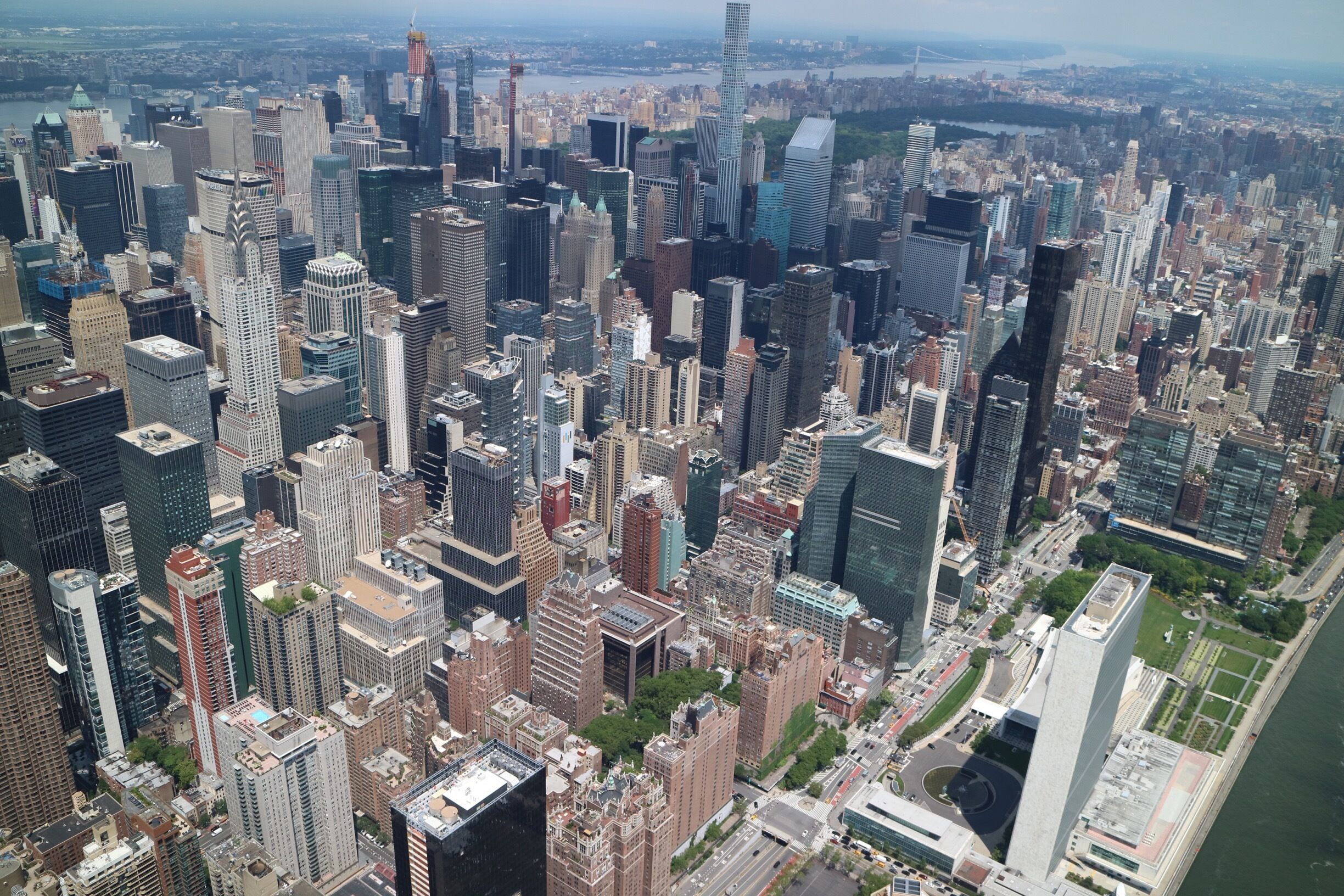 #AboveItAll #lifeatexpedia  #GreatOutdoors #Perspectives
Going to New York and have the opportunity to live an experience in a doors off helicopter, is unbelievable. This photo is from the city and we can see far away the Chrysler Building that has 1,046 feet. As of 2018, this brick building is the eight-tallest building in the city, tied with The New York Times Building. #nyc #newyorkcity #lovetotravel #helicopter #amazingview