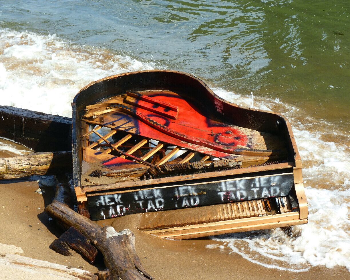 Under the Brooklyn Bridge:  Where old Broadway pianos go to die?  Take a stroll along the East River from the South Street Seaport to the Brooklyn Bridge.  You'll get great photos of the Bridge, along with some interesting finds like this.