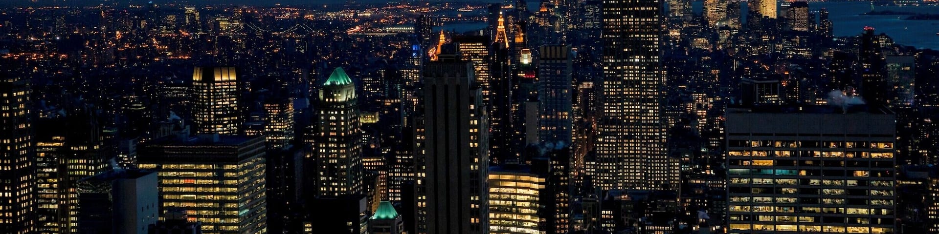 30 Rockefeller Plaza is an Art Deco skyscraper in the middle of Rockefeller Plaza in Manhattan. At 850 feet (260 m) high, the 70-story building is the 14th tallest in New York City and is a great place for capturing views at sunset (especially because it offers views of the Empire State Building).
To get this shot, head to the top of Rockefeller Center, known as "Top of the Rock." The entrance is on W 50th St between 5th and 6th Avenues. Tickets can be purchased on the basement level of building. Be sure to purchase your tickets in advance in order to make your way to the top by sunset (the entry system is timed). Also allot time for a security screening and wait times at the elevator.
Once you arrive at the observation deck take the escalator to the upper levels where your views won't be impeded by the glass windscreens. Tripods are not allowed (although monopods are allowed), but you can rest your camera on the stone barriers of the upper observation deck. Additionally you can use a table-top tripod for stability.
#StunningStructures
#UrbanJungle