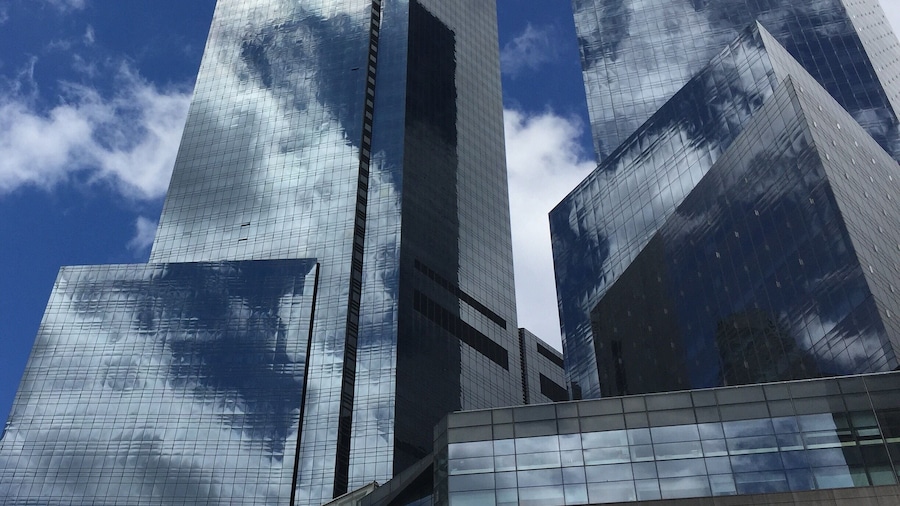 Clouds were moving so fast past the building it was dizzying to look up