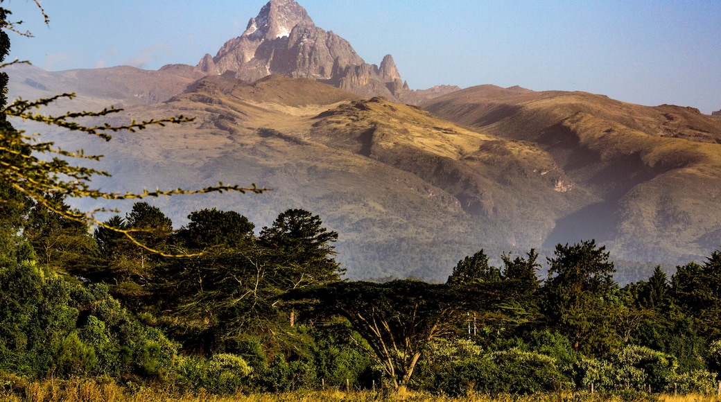 Dramatic view of Mount Keynya with the mist rising from forest below in Nyeri County, near Nanyuki; Kenya, Africa