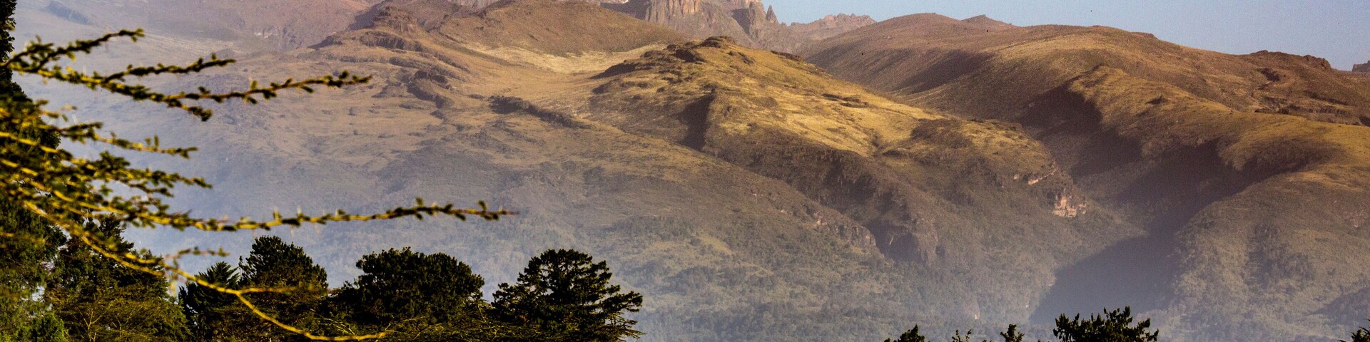 Dramatic view of Mount Keynya with the mist rising from forest below in Nyeri County, near Nanyuki; Kenya, Africa