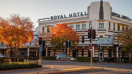 Orange featuring heritage elements, a small town or village and a sunset