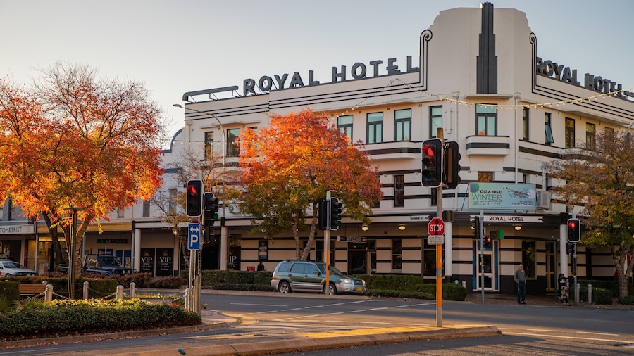 Orange featuring heritage elements, a small town or village and a sunset