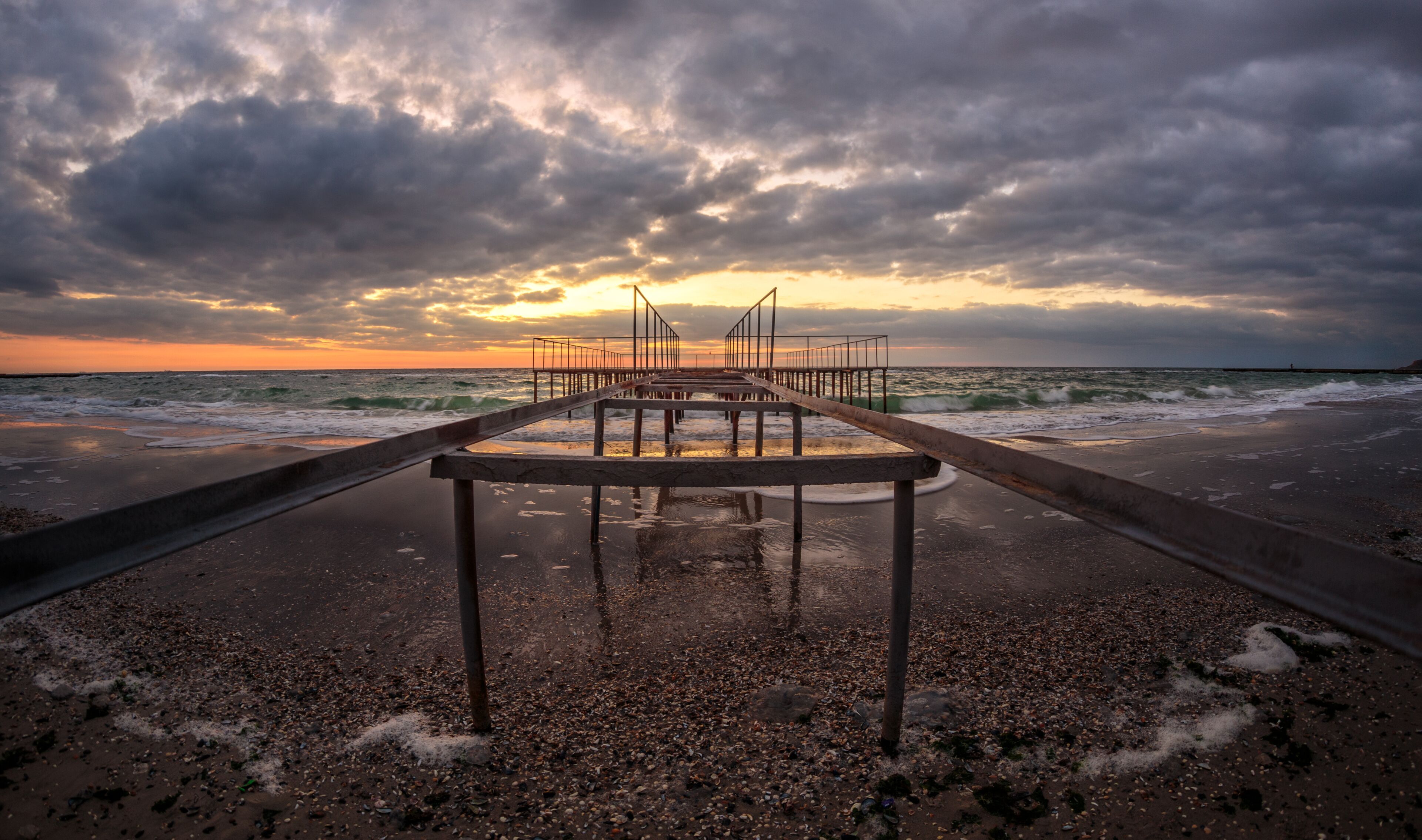 The pier in the cloudy sunrise