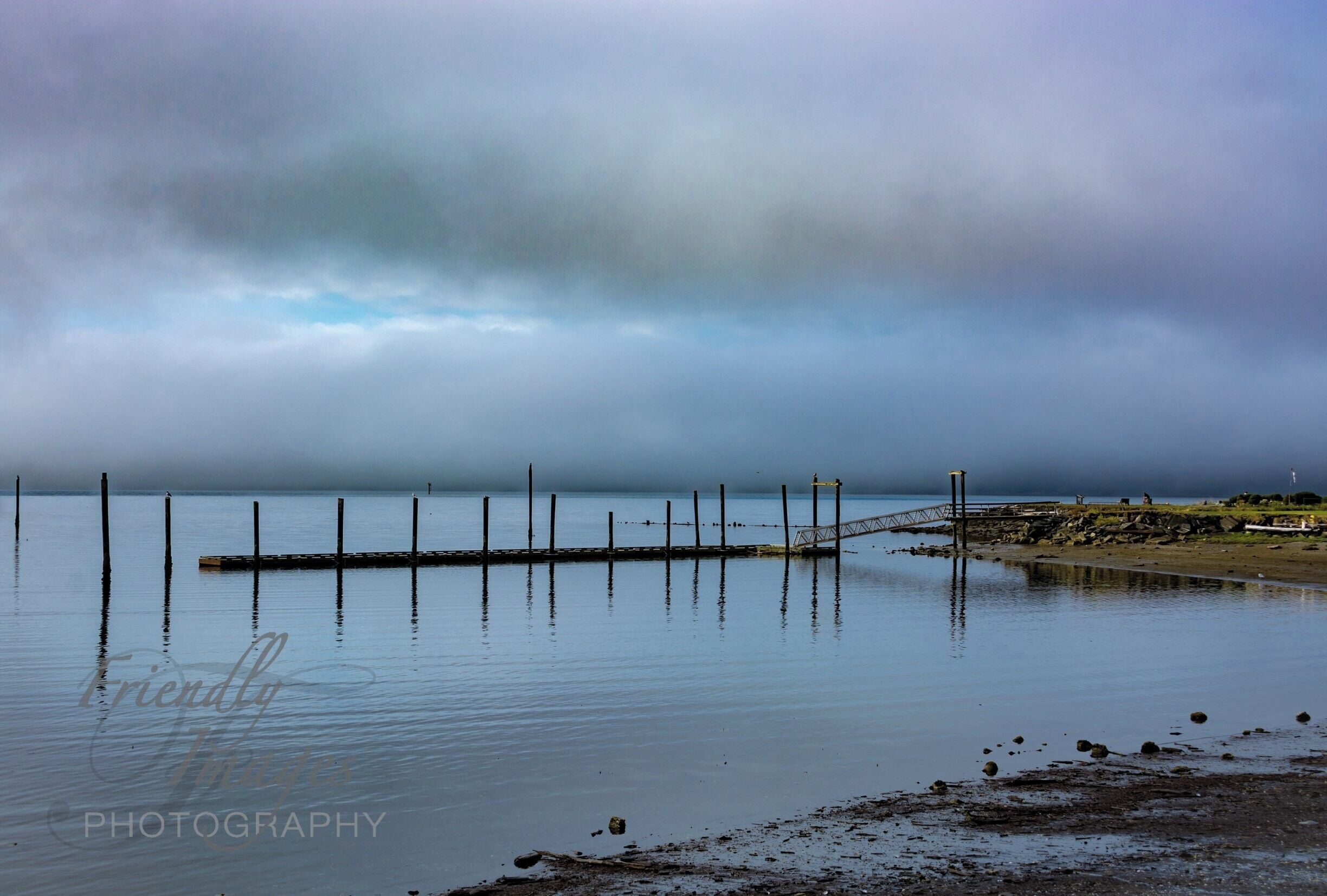 It was a beautiful misty and foggy day. and the light was perfect as the sun came up over the harbor making for shot of the old pier. in the harbor.
Friendlyimagesphotography.com