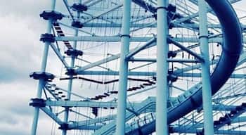 This is the worlds tallest slide. The Boathouse District is not finished yet but when it is it's likely going to be Oklahoma's key attraction for summer fun. Read more below as listed on their website.
If you’re looking for fun things to do in Oklahoma City, the Boathouse District offers some of OKC’s top attractions. Get on the water with rowing, kayaking, dragon boating or stand up paddle boarding. Reach for the sky with RIVERSPORT Adventures where you’ll find the 700-foot SandRidge Sky Zip across the Oklahoma River, the six-story SandRidge Sky Trail, the 80-ft Rumble Drop free fall, a high speed spiral slide and more!
Located in the heart of Oklahoma City, the Boathouse District also offers the city’s most unique event spaces for corporate events, parties and picnics. Make your event even more memorable when you add team building or dragon boating. Whenever you visit the river, watch for the Olympic hopefuls in rowing and canoe/kayak training on the Oklahoma River, an official U.S. Olympic and Paralympic Training Site.