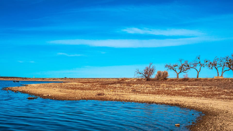 Tranquil sunny landscape of curving cove at Lake Fort Phantom Hill in Abilene, Taylor and Jones Counties, Texas, USA