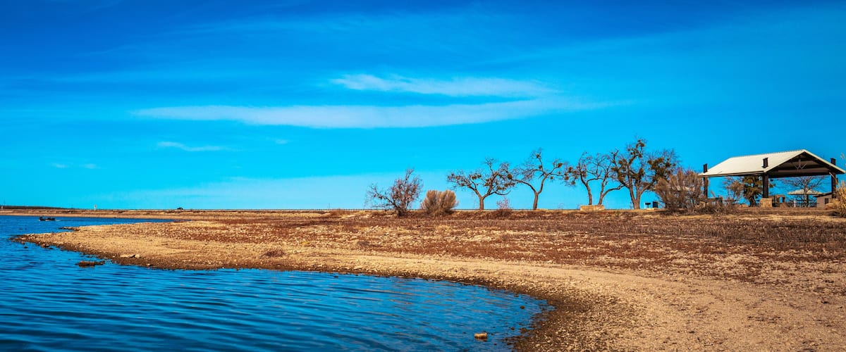 Tranquil sunny landscape of curving cove at Lake Fort Phantom Hill in Abilene, Taylor and Jones Counties, Texas, USA