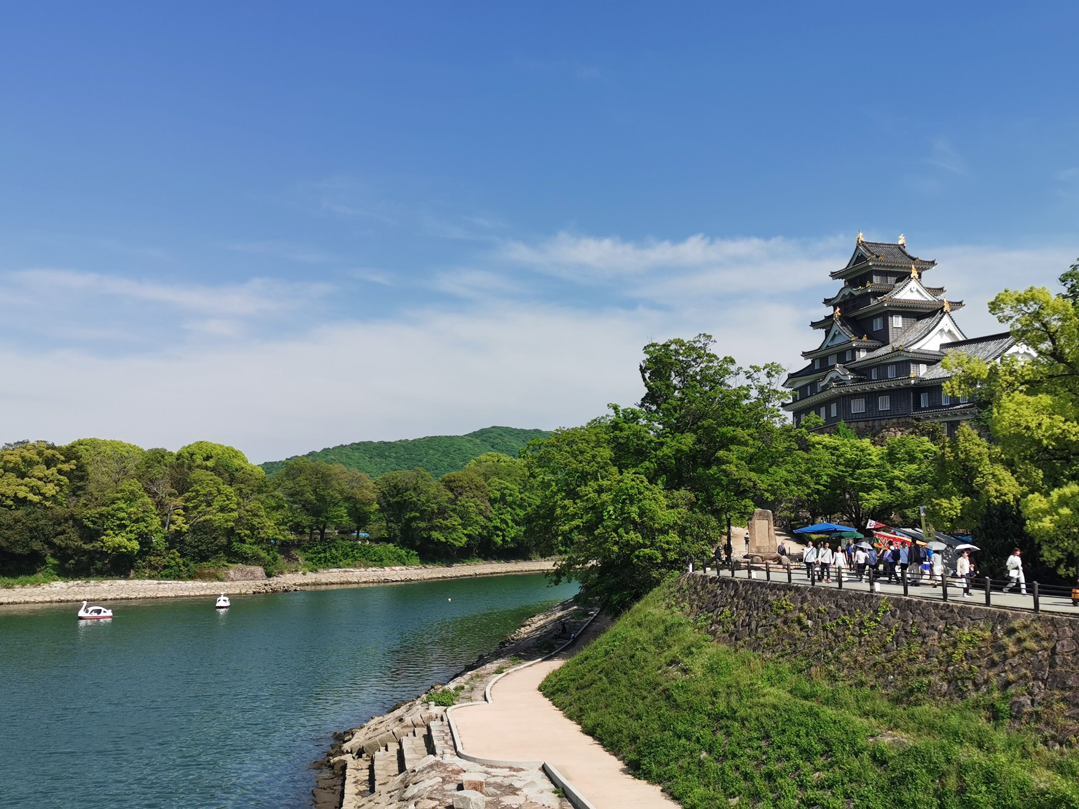 Okayama Castle against the clear blue skies..