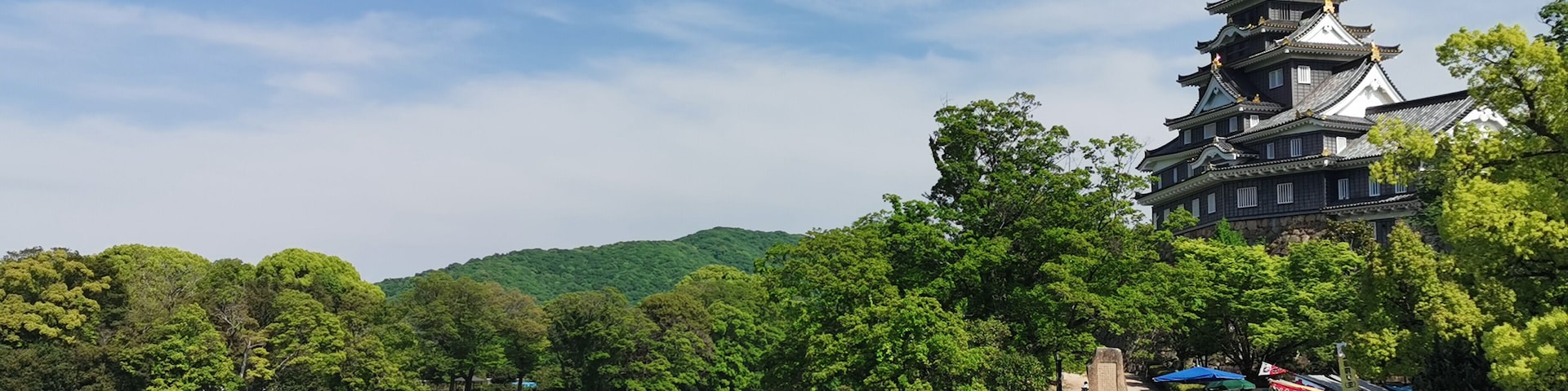 Okayama Castle against the clear blue skies..