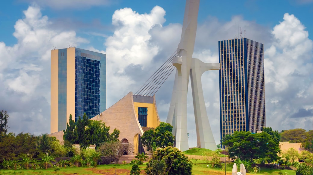 The modern skyline of the plateau district of Abidjan with St. Paul Cathedral in the foreground Abidjan, Côte d'ivoire (Ivory Coast), West Africa