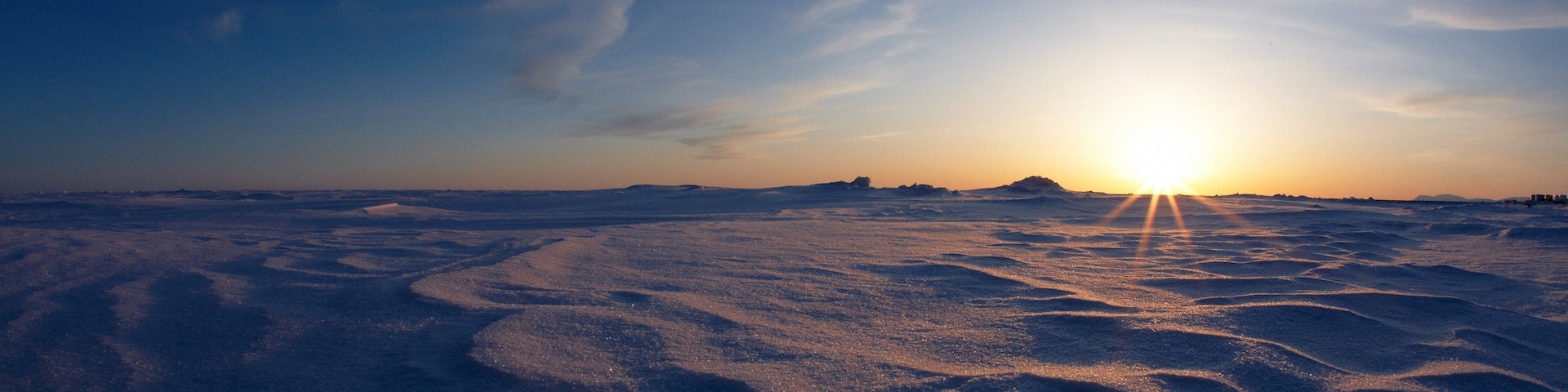 Nome featuring a sunset and snow