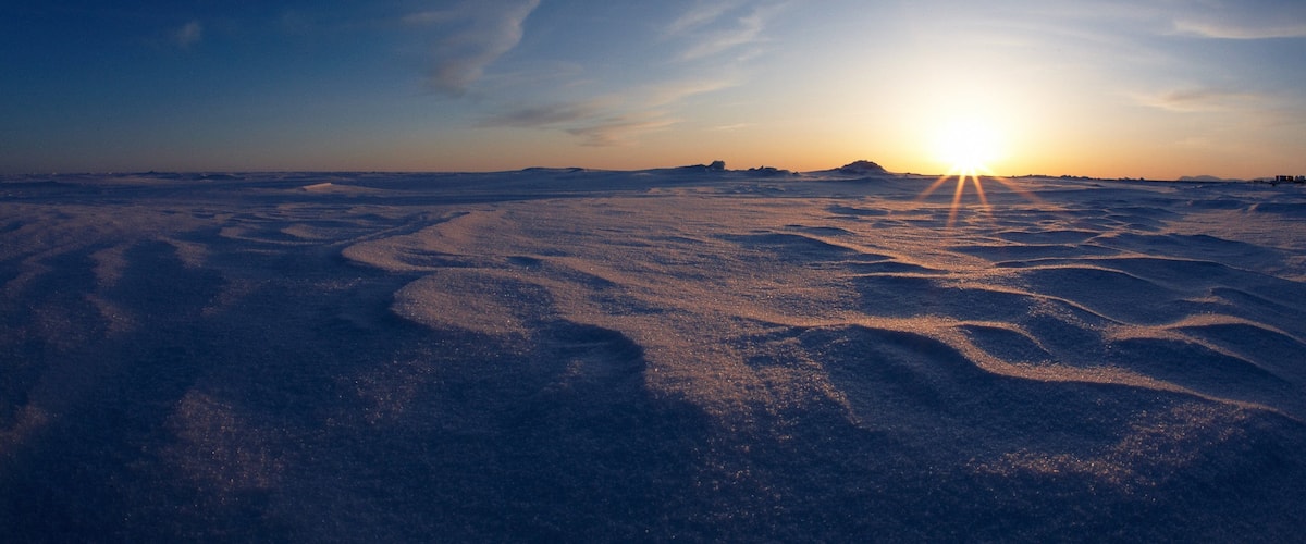 Nome featuring a sunset and snow