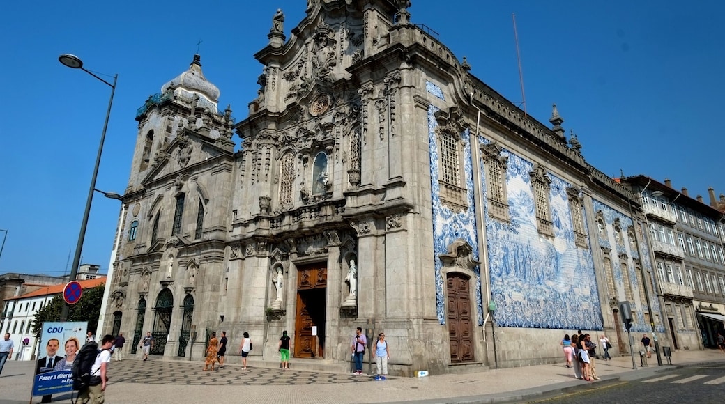 Connected to its twin church by a house, this baroque church has a well-known tiled side facade.