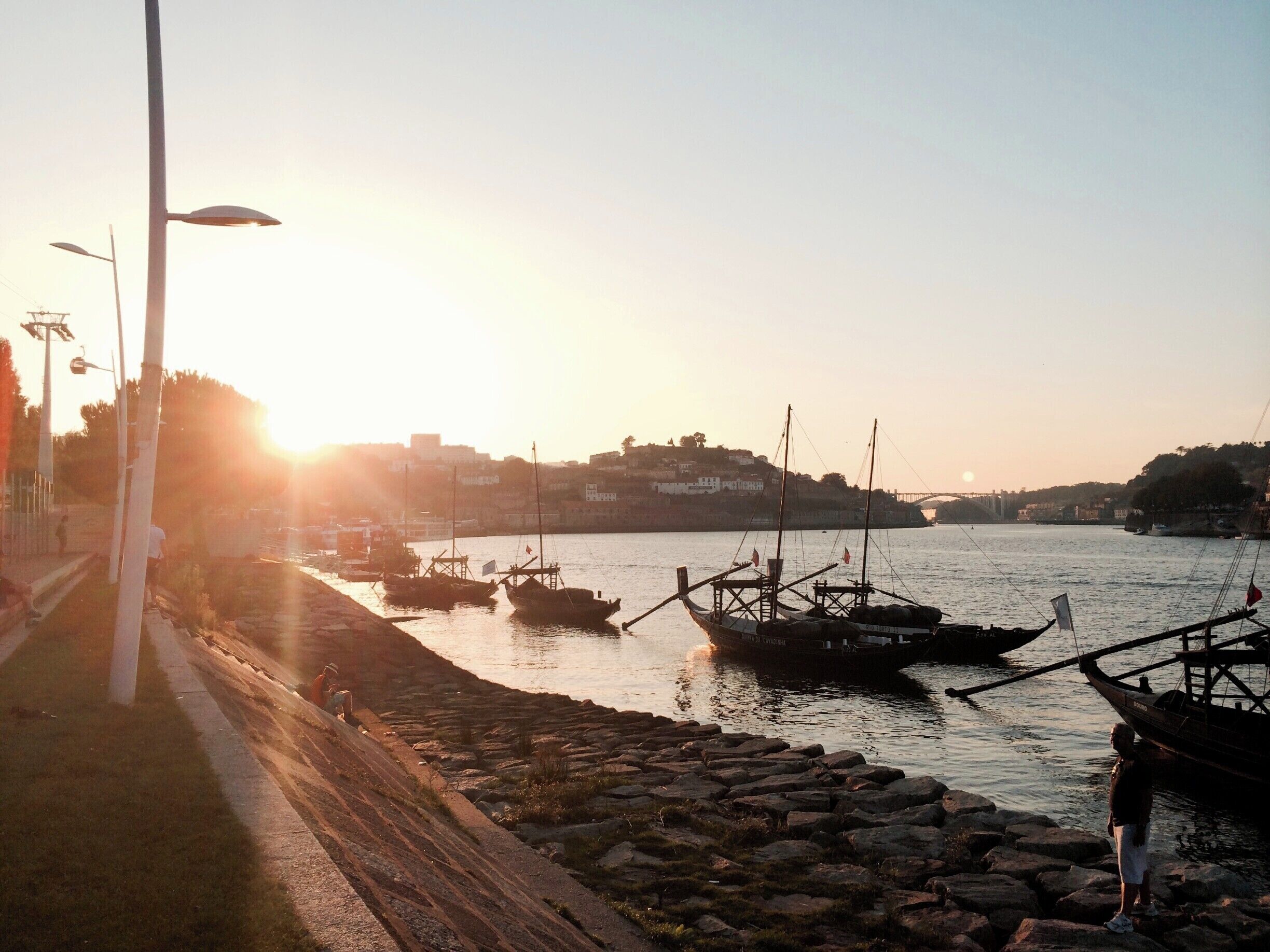 Sunset over the Douro River in Oporto, Portugal. 
More info: http://www.badsentences.com/travel-porto-part-i/