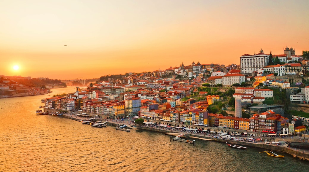 Magnificent sunset over the Porto city center and the Douro river, Portugal. Dom Luis I Bridge is a popular tourist spot as it offers such a beautiful view over the area.